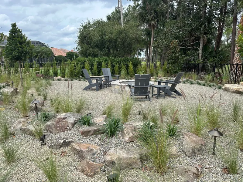Outdoor fire feature alongside a custom pool — Central Florida 1