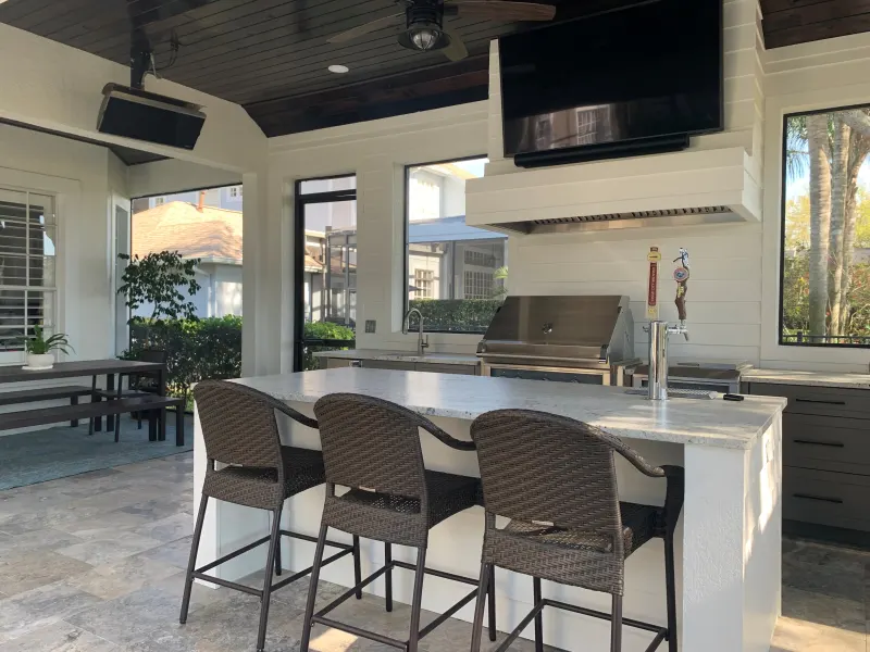 Outdoor kitchen by a custom pool — Central Florida 5