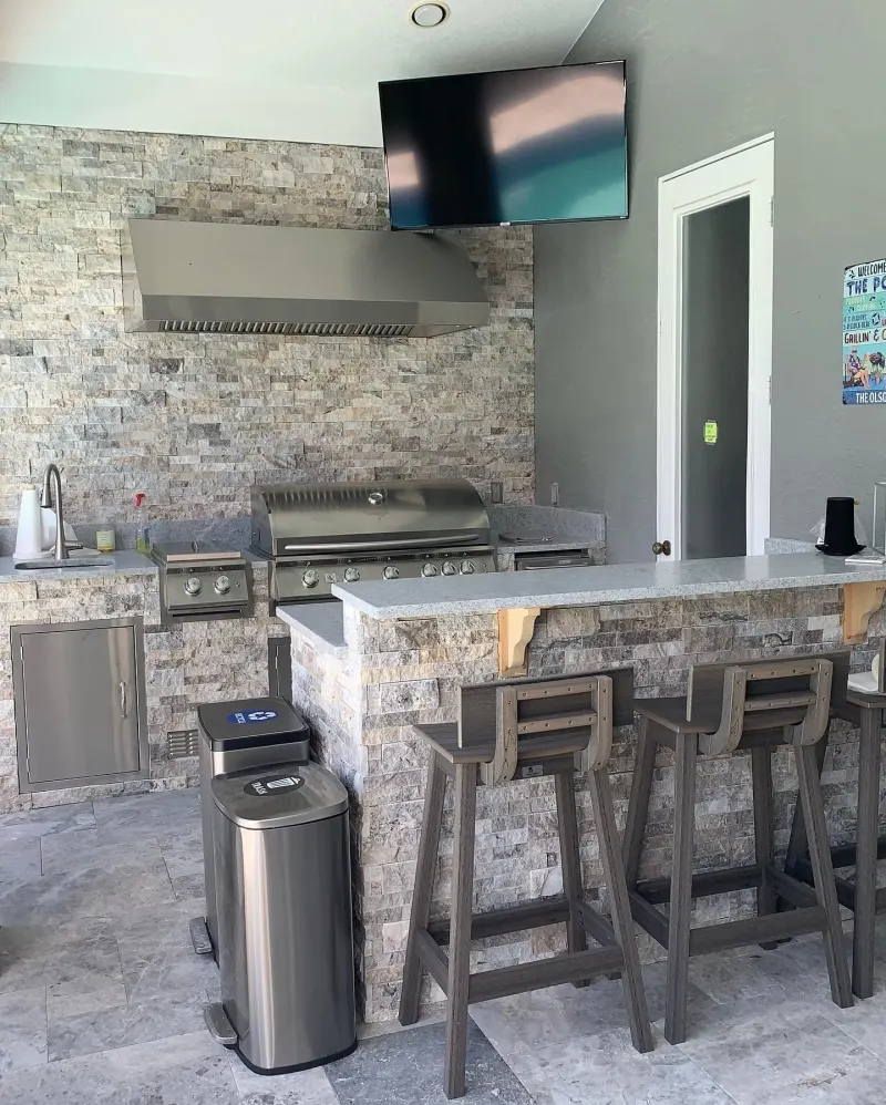 Outdoor kitchen by a custom pool — Central Florida 6