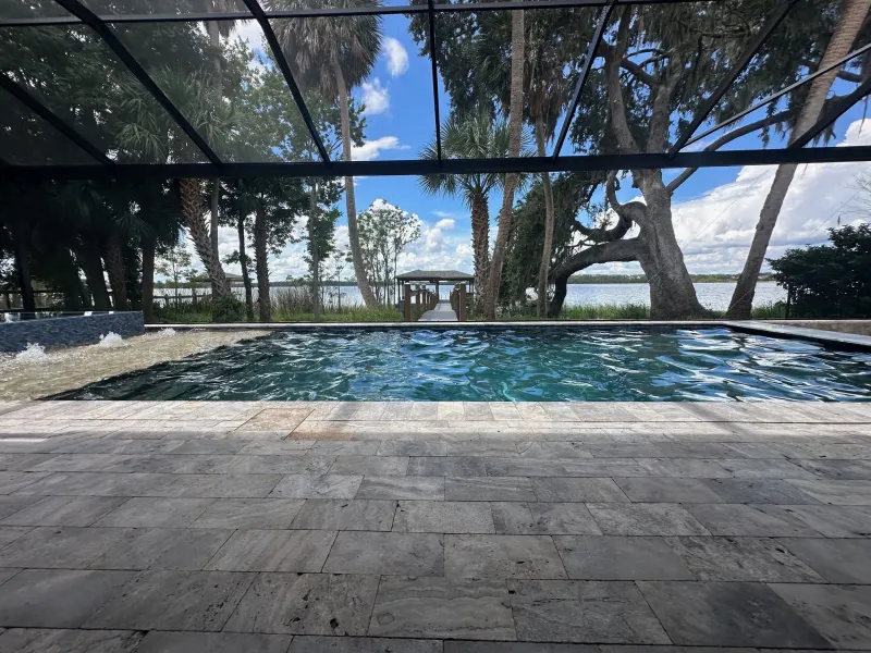 Screen enclosure over a custom pool — Central Florida 7