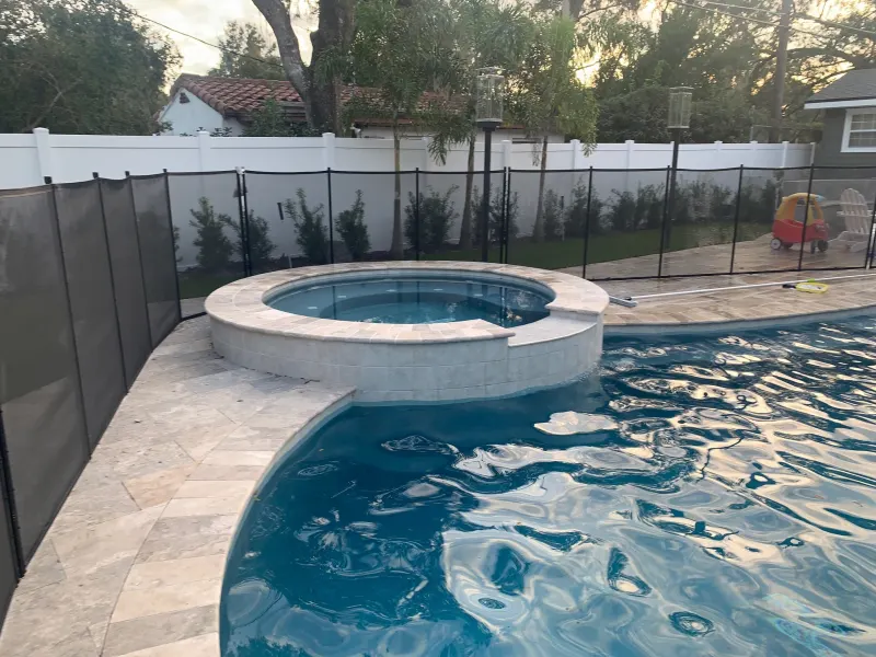Spa addition with spillover water feature — Next Level Pools and Spas 2