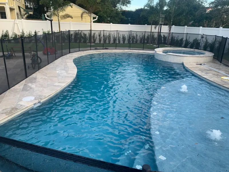 Signature sun shelf detail in a custom pool — Next Level Pools and Spas 3