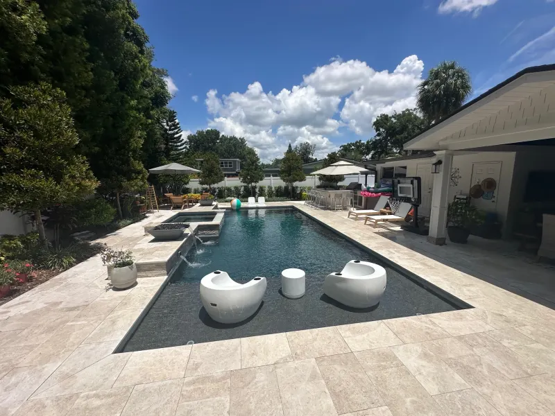 Signature sun shelf detail in a custom pool — Next Level Pools and Spas 5