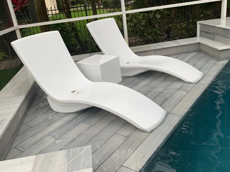 Signature sun shelf detail in a custom pool — Next Level Pools and Spas 7